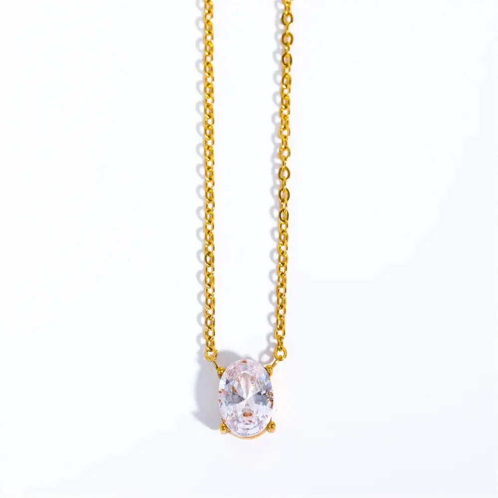 Dainty oval gold diamond necklace
